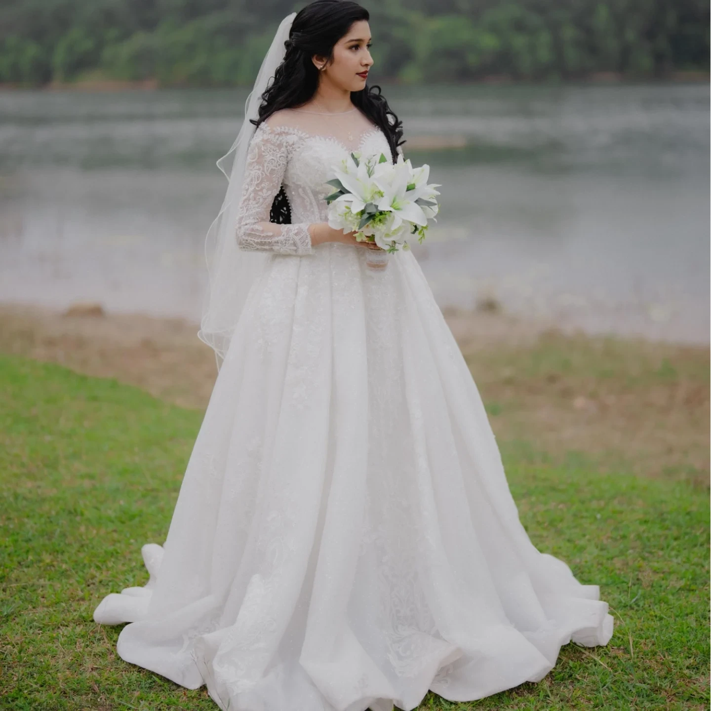 Bride in a white bridal gown — Colony Shop Bridal collection