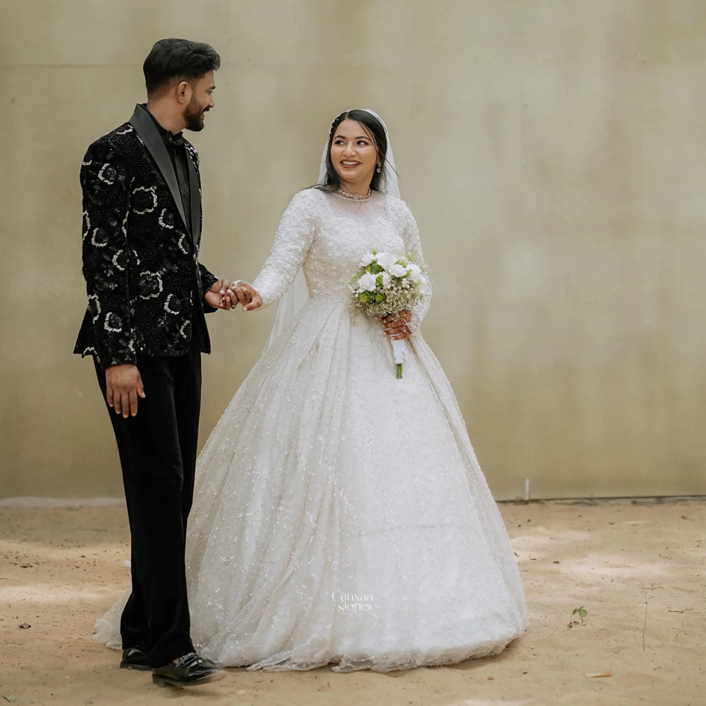 A couple on their wedding day — Colony Shop & Bridal Loft